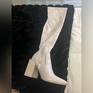 Knee-High Boots
Steve Madden 
I am a 6.5 and the 7.0 fits me perfect